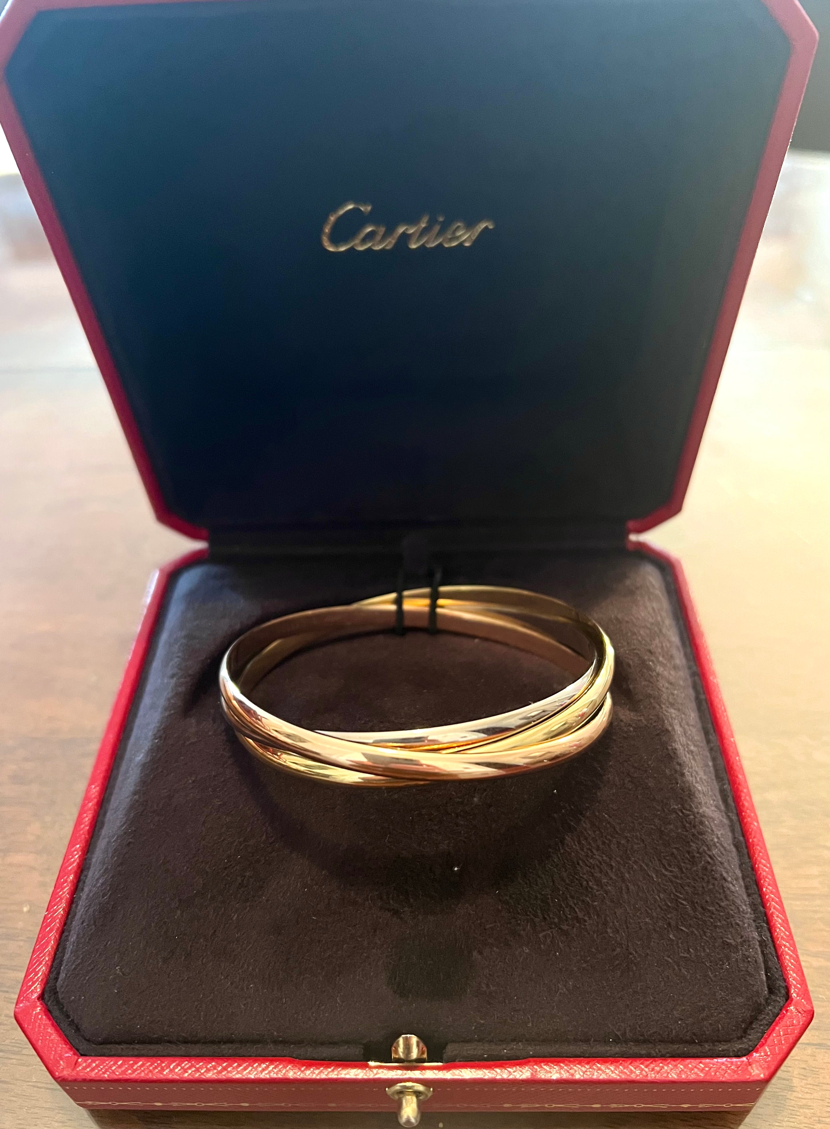 Signed bracelet Cartier Trinity Medium Model 3 Gold Bracelet. Les Pierres de Julie