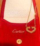Pendentif / Collier Cartier Coeur et Symbole Or Jaune 18 Carats